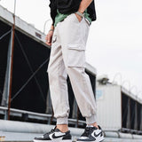 2020 hip hop menino multi-bolso elástico na cintura harem calças homem streetwear punk calças casuais corredores masculinos tornozelo-comprimento dos homens